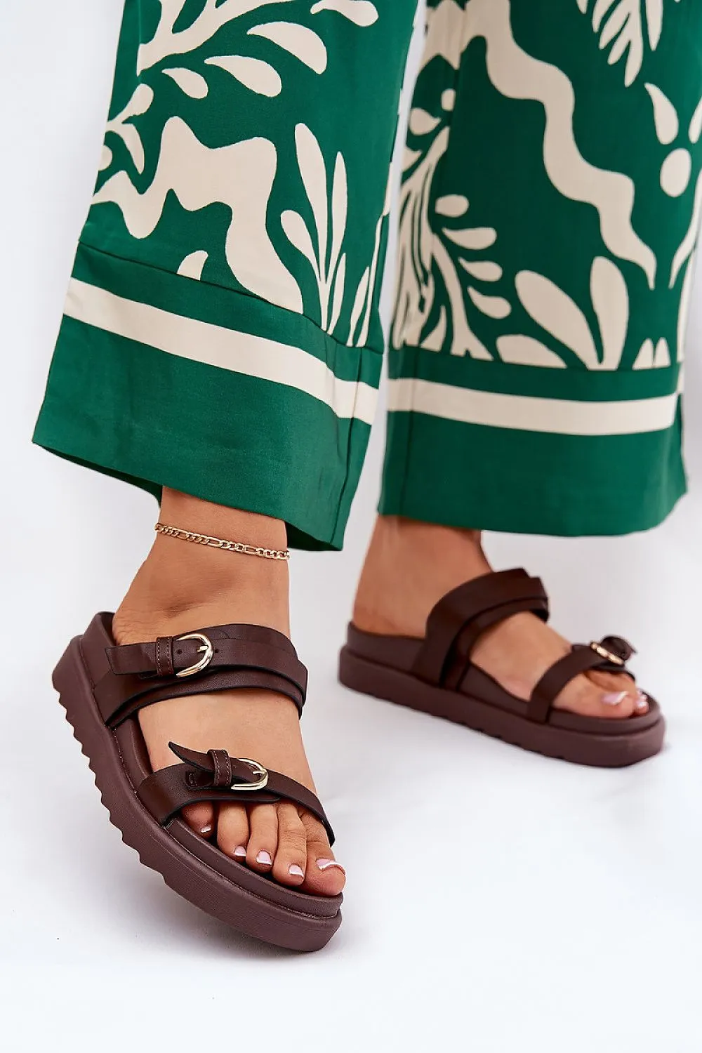 Stylish women slides on a platform