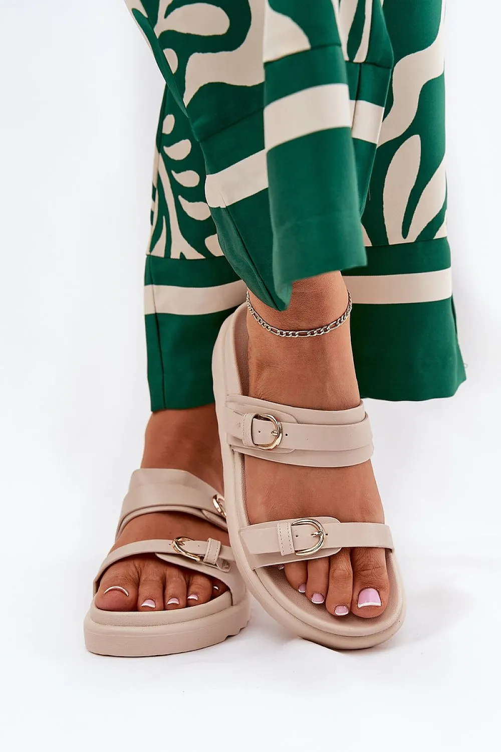 Stylish women slides on a platform